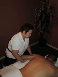 Picture of a man getting a back massage
