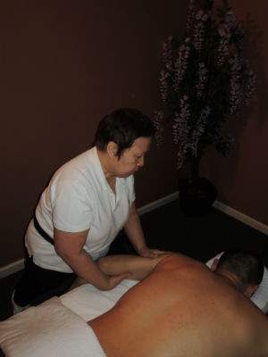 Man Getting Arm Massaged